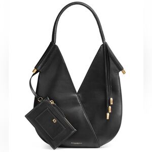 Donna Karan Black purse with leather wrapped handle and gold accents